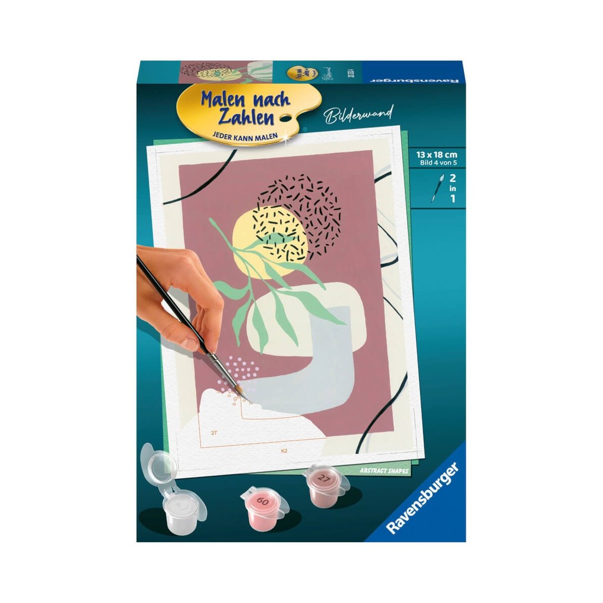 Box mit Malen-nach-Zahlen-Set: abstraktes Design und eine Hand, die einen Pinsel hält.