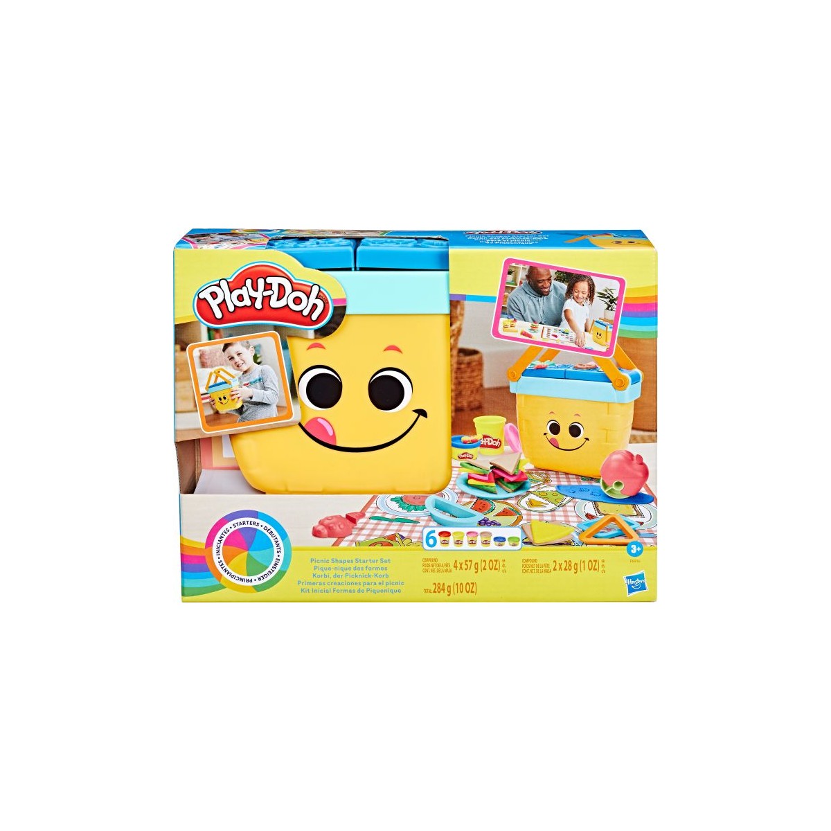 Play-Doh-Set mit gelbem Behälter, verschiedenen Werkzeugen und bunten Play-Doh-Kneten auf der Verpackung.
