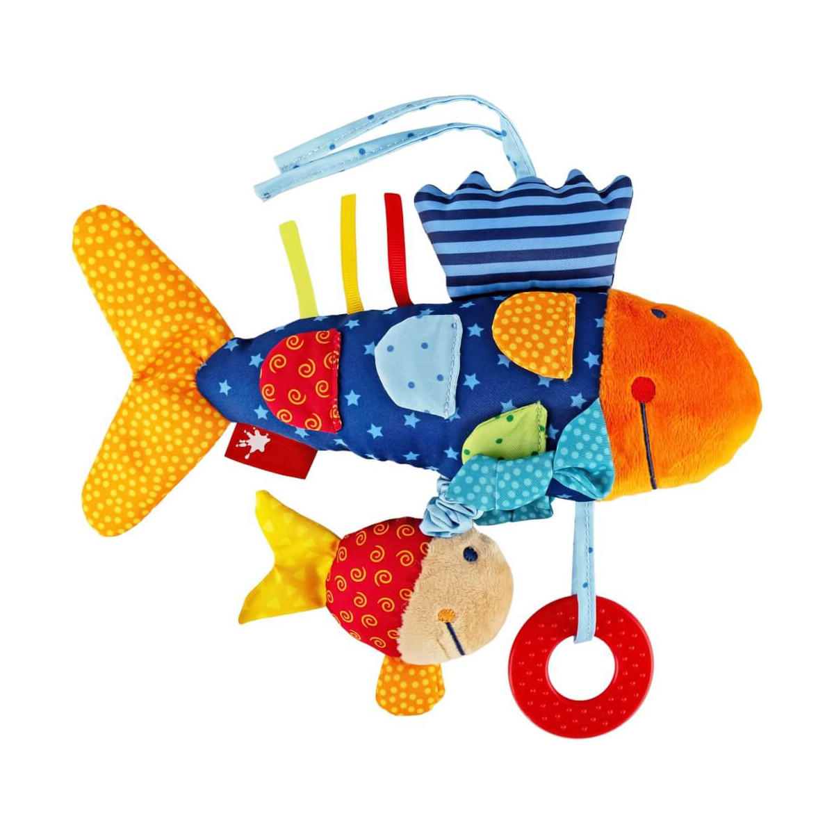 Bunter Stoff-Fisch mit Mustern, kleinen angehängten Fischen und rotem Ring unten.