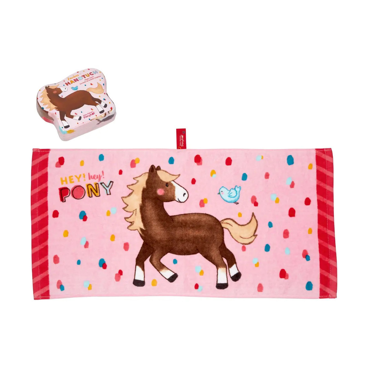 Rosa Handtuch mit Pony-, Vogel- und Punktmotiven; Dazu passende Pony-Metallbox oberhalb des Handtuchs.