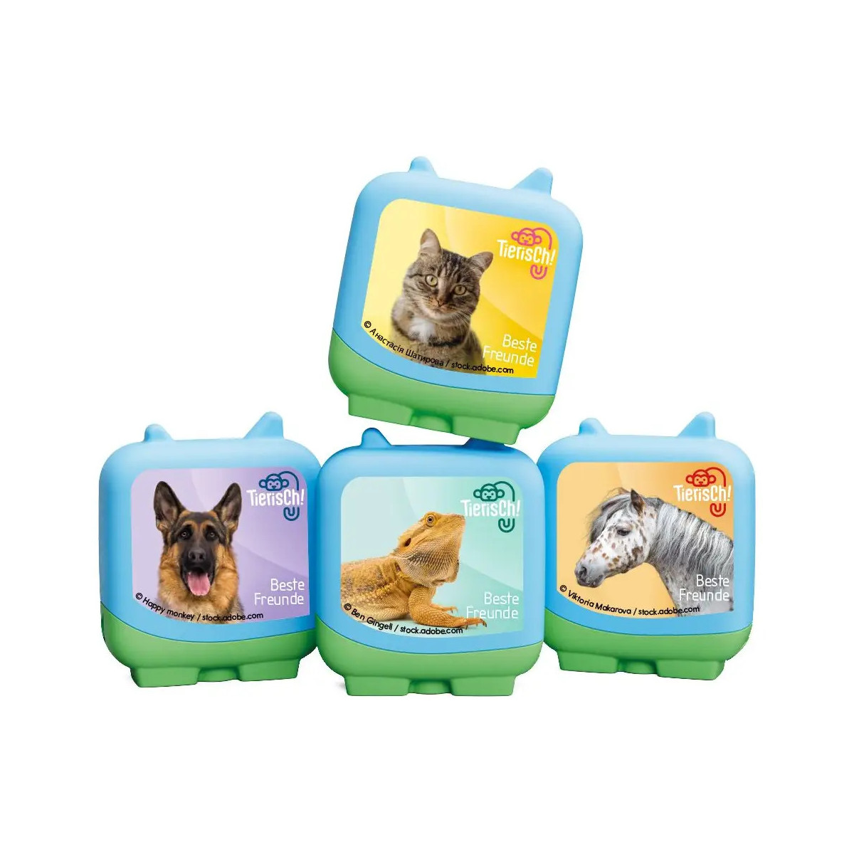 Vier bunte Dosen mit Bildern von Katze, Hund, Pferd und Kätzchen, beschriftet mit „Beste Freunde“.