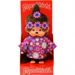 Monchhichi-Puppe in roter Box mit lila Blumenkleid und passendem Haarband.