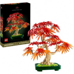 LEGO Bonsai-Baum mit roten und orangefarbenen Blättern neben der Box auf weißem Hintergrund ausgestellt.