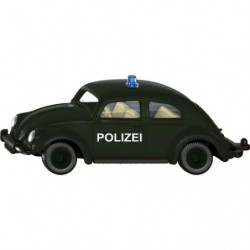 Kleines Spielzeug-Polizeiauto mit grünem Lack, blauer Sirene und "POLIZEI"-Schriftzug an der Seite.