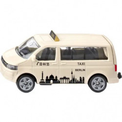 Beiges Modell eines Berliner Taxi-Vans mit Skyline-Grafik auf der Seite, von links betrachtet.