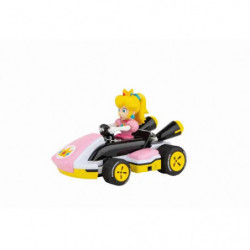 img_0:Prinzessin Peach fährt in einem pink-gelben Go-Kart; Spielfigur vor weißem Hintergrund.